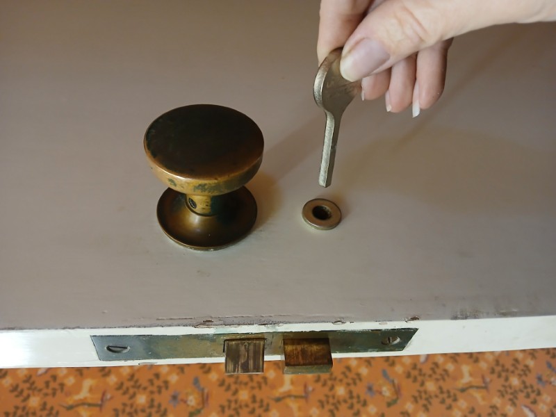 Vintage door rim lock and keyhole