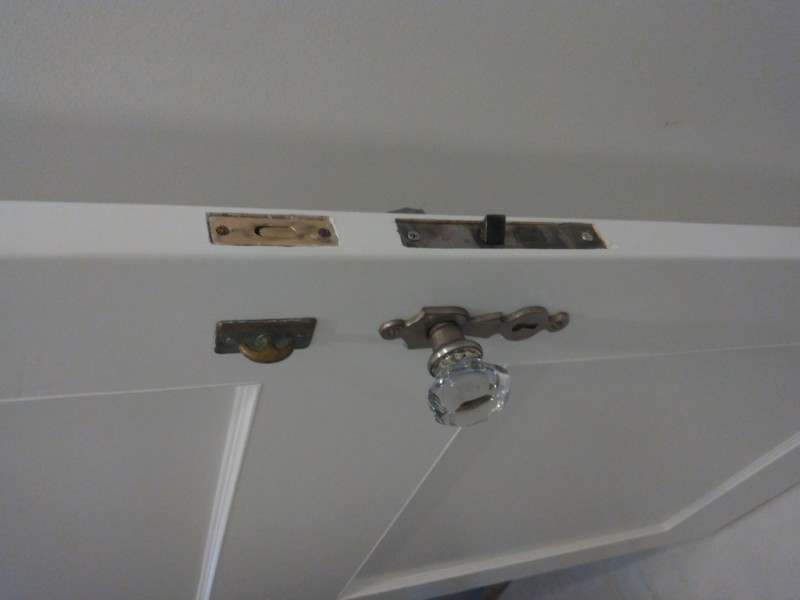 Installed glass knob and antique plates
