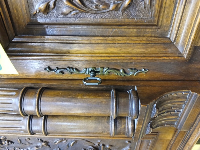 Ornate cabinet lock escutcheon